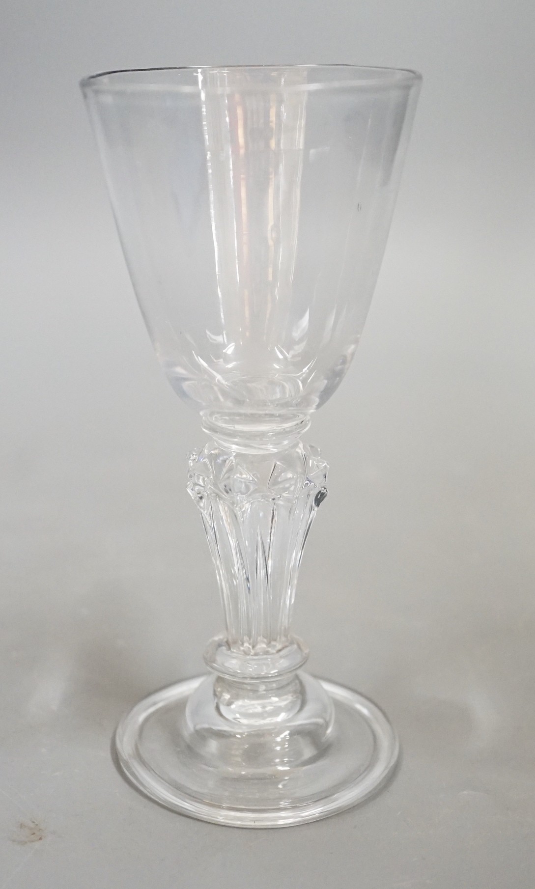 A pedestal stem wine glass, c.1730, 15cms high